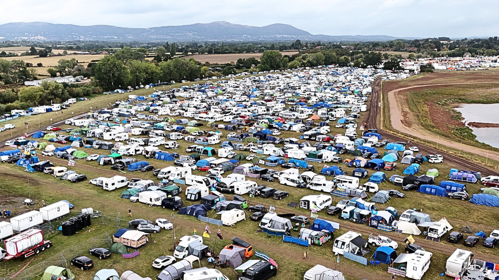Camping at Sunshine Festival. Park next to your tent